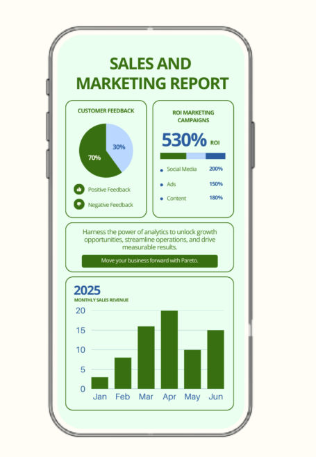 Person working on a laptop beside a notepad and pen